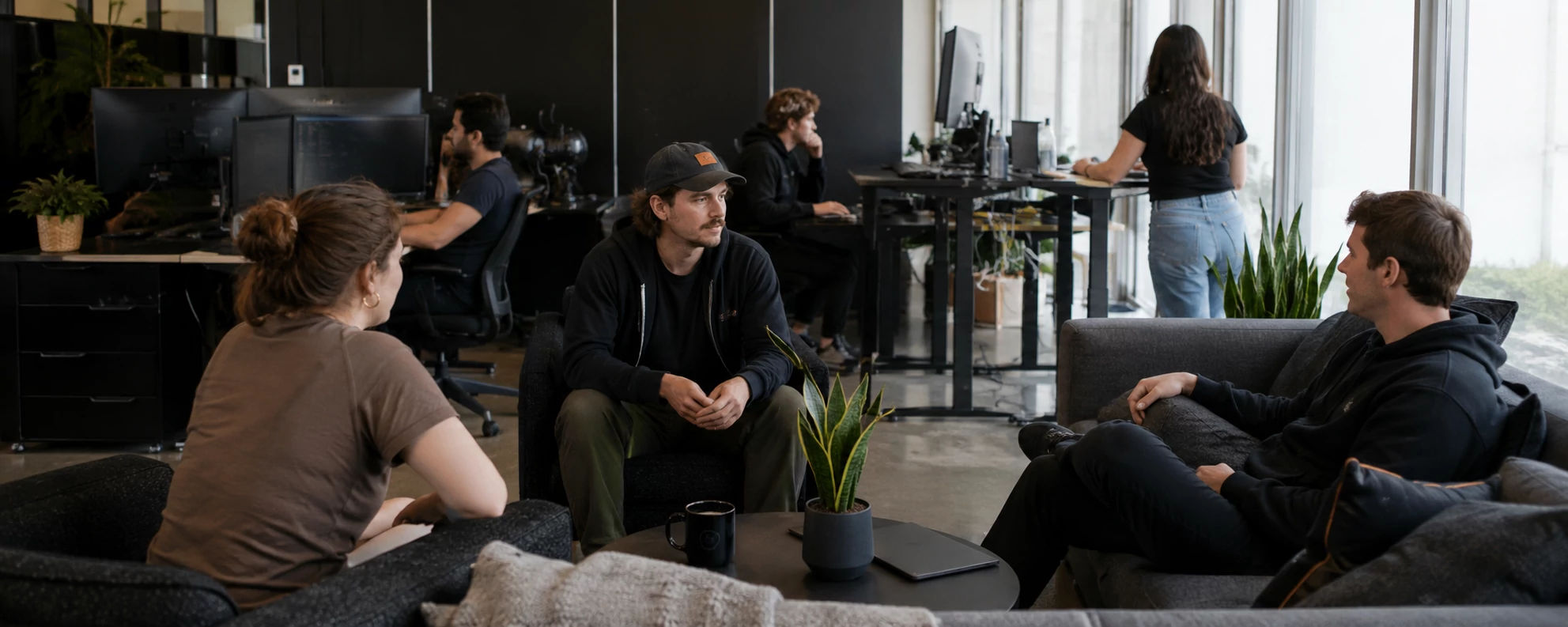 Software team members collaborating in a modern office